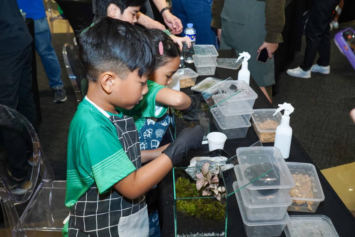 Participants get hands-on in a terrarium-making workshop at Book Nook, designing their own miniature green spaces while learning about sustainability and the art of plant care. This interactive session encourages creativity, mindfulness, and a deeper connection with nature — one tiny ecosystem at a time!