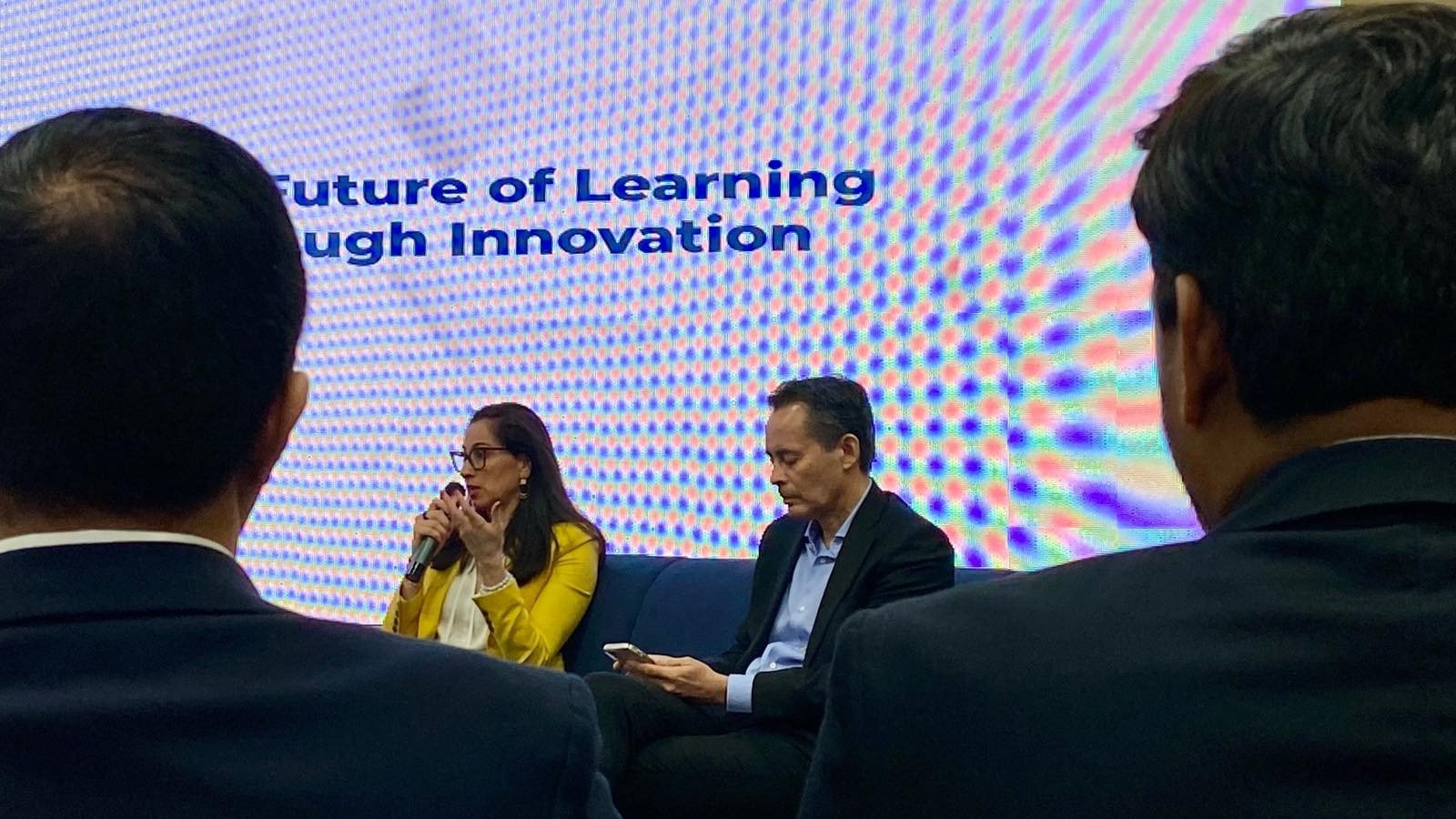 Karine Allouche, Coursera’s Global Head of Enterprise and Alfredo I. Ayala, President of iPeople Inc. answer questions from the media