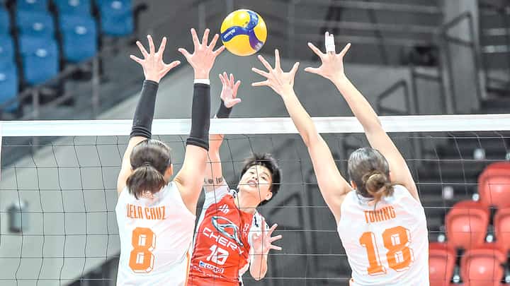 Ara Galang refuses to get intimidated as she attacks two Farm Fresh defenders to lead Chery Tiggo to a 29-27, 15-25, 25-22, 25-21 victory in the Play-in phase of the PVL All-Filipino Conference on Tuesday.