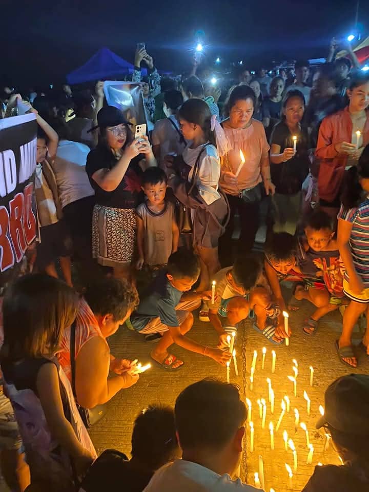 Parents, children join candle ceremony in Bislig, Surigao del Sur.