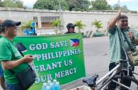 Ranque (with cap) during the 23 February "God Bless the Philippines" prayer rally near People Power monument along EDSA, Quezon City.