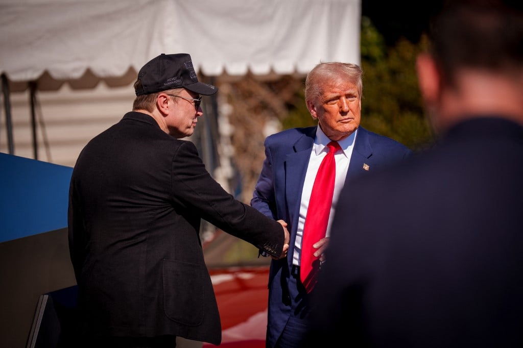 Show of support or showroom? Trump talks up Tesla at White House