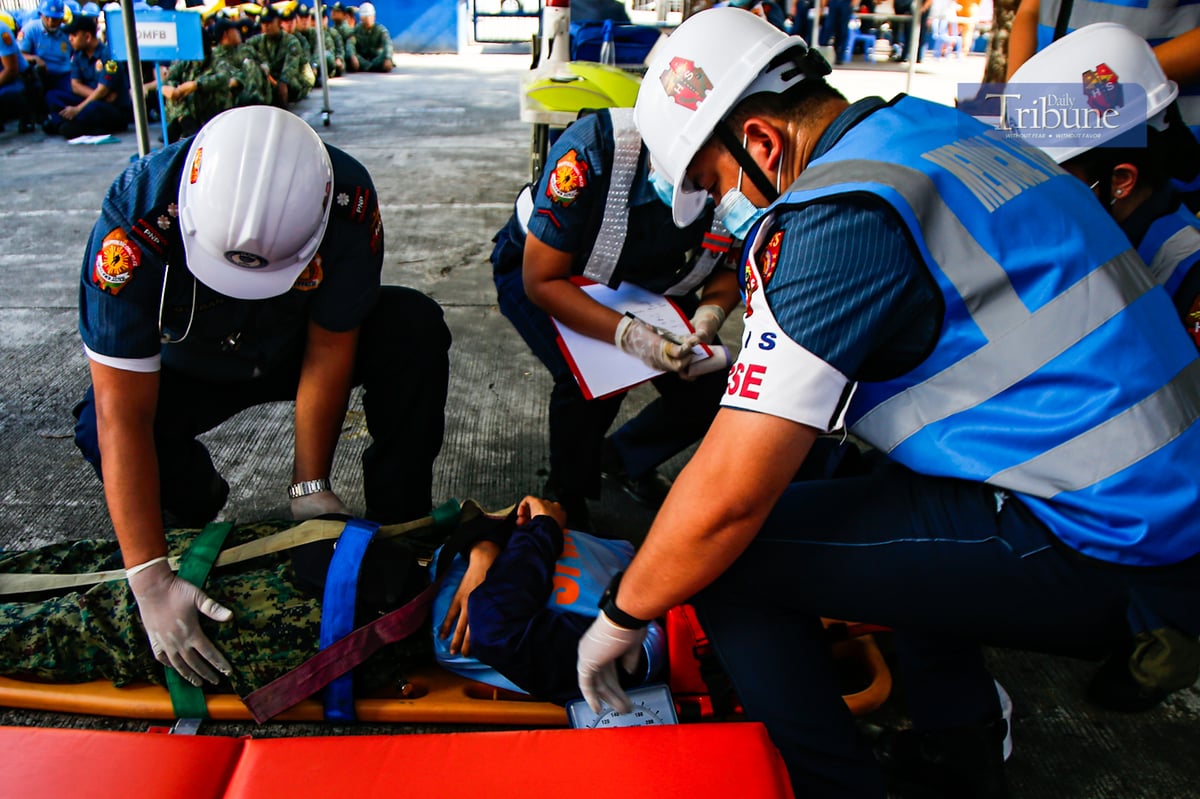 MANILA'S FINEST: Personnel from the Manila Police District participate in the first-quarter nationwide simultaneous earthquake drill at MPD grounds on UN Avenue, Manila, on 13 March 2025. The quarterly exercise aims to enhance preparedness among agencies and local government units while educating the public on earthquake safety measures.