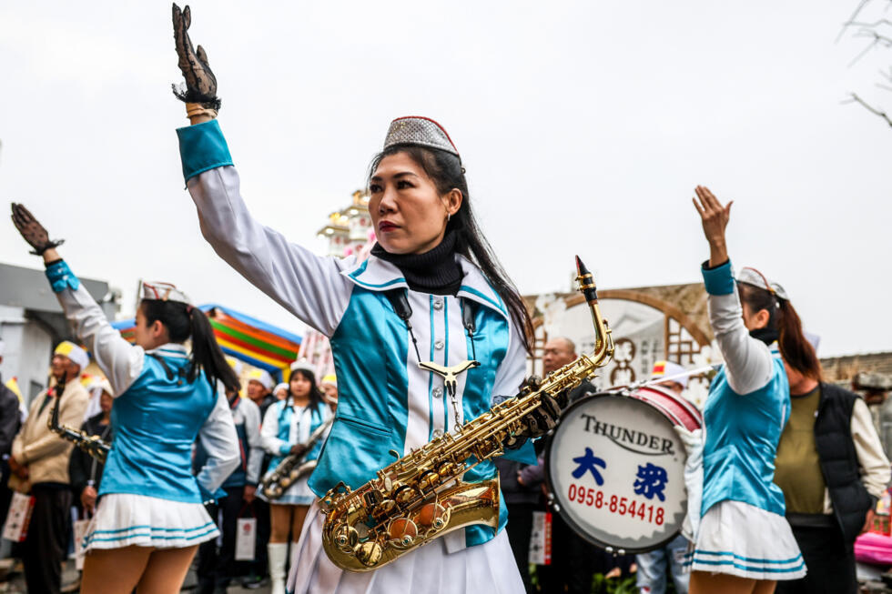 All-women marching band livens up funerals 