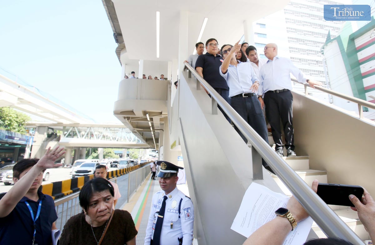 Transportation Secretary Vince Dizon, MMDA Chairman Don Artes, SM Prime Holdings President Jeffrey Lim, and Green EDSA Movement and Management Association of the Philippines Chairman Eduardo Yap inspect the newly opened SM North EDSA Busway Concourse during its inauguration on Thursday, 13 March.