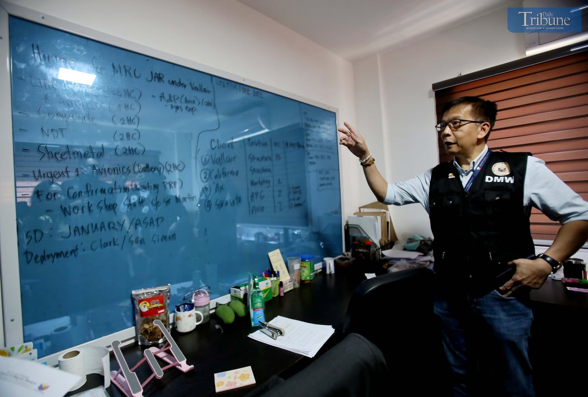 (March 14 2025) Migrant Workers Secretary Hans Leo J. Cacdac inspect at the Aero Strategies agency an alleged illegal recruitment of OFWs, following the victims complain, At 83 Anastacia St. Samson Ville Subdivision, DAU, Mabalacat City, Pampanga, on Friday March 14 2025. Photo/Analy Labor