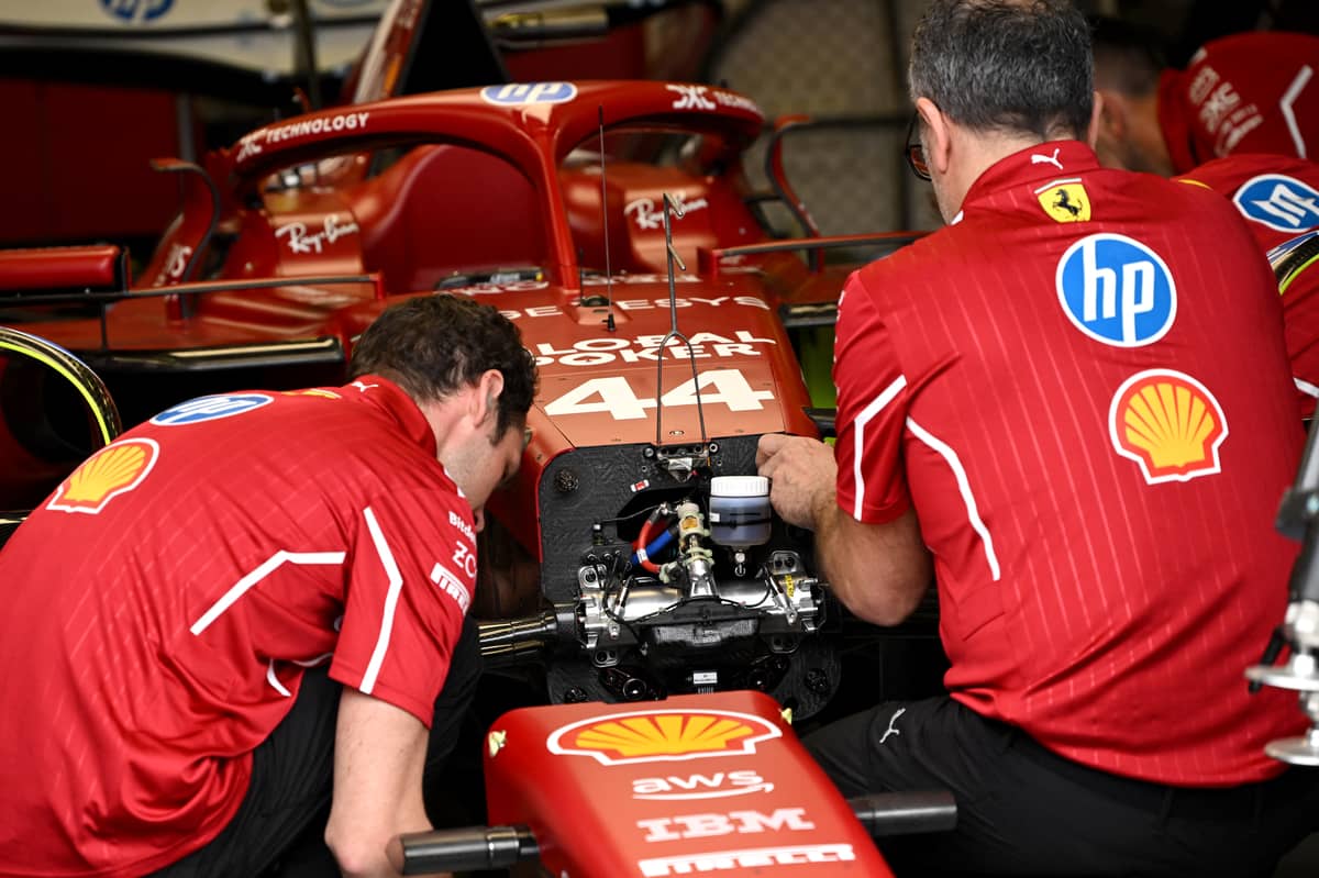 Ferrari mechanics meticulously prepare Hamilton’s new machine, fine-tuning every detail for the season ahead.