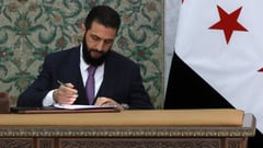Syria leader signs constitutional declaration