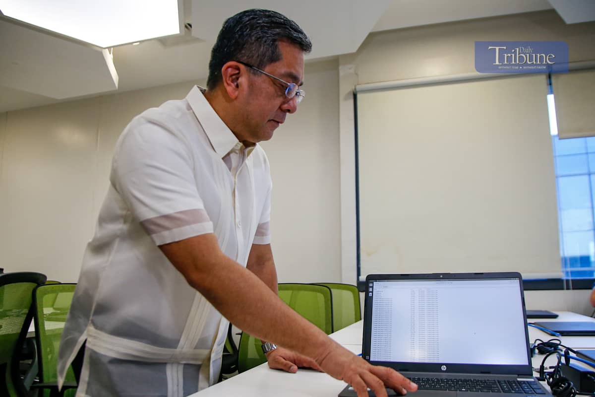 COMELEC Chair George Erwin Garcia conducts a technical walkthrough with representatives from the Parish Pastoral Council for Responsible Voting (PPCRV), National Citizens' Movement for Free Elections (NAMFREL), and the Legal Network for Truthful Elections (LENTE), as well as dominant majority and minority parties, at Data Center 3 in Makati City on 14 March 2025. Technical personnel from the media network also participated in the walkthrough.