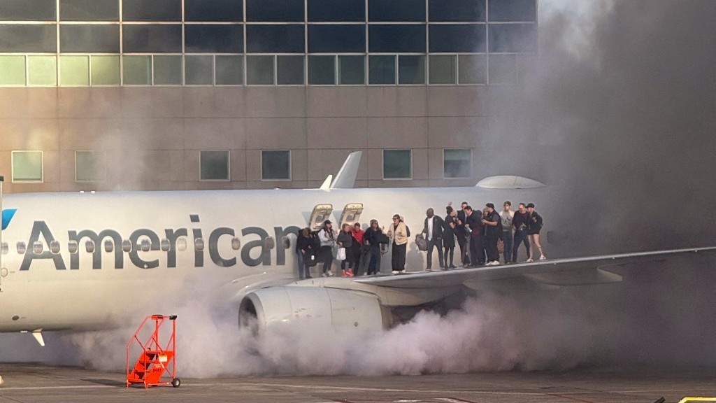 American Airlines jet catches fire after landing at Denver Airport