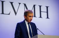 (FILES) Head of top luxury conglomerate LVMH Bernard Arnault presents the group's 2024 annual results in Paris, on 28 January 2025. LVMH will propose at its annual general meeting to raise the CEO retirement age from 80 to 85, allowing Bernard Arnault, 76, to remain at the helm of the world's leading luxury goods company for longer.
