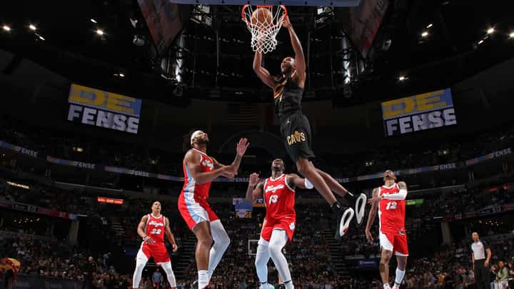 Evan Mobley slam dunks his way to 22 points to lift Cleveland score its franchise record 16th straight win with a 133-124 conquest of the Memphis Grizzlies in their NBA regular season game.
