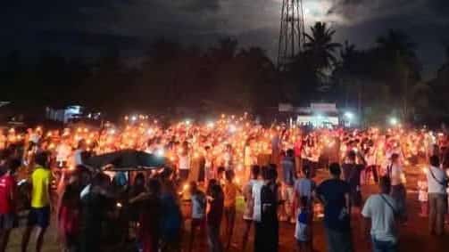People converge at the town of Las Nieves, Agusan del Norte Saturday night holding candles, praying for return of FPRRD.
