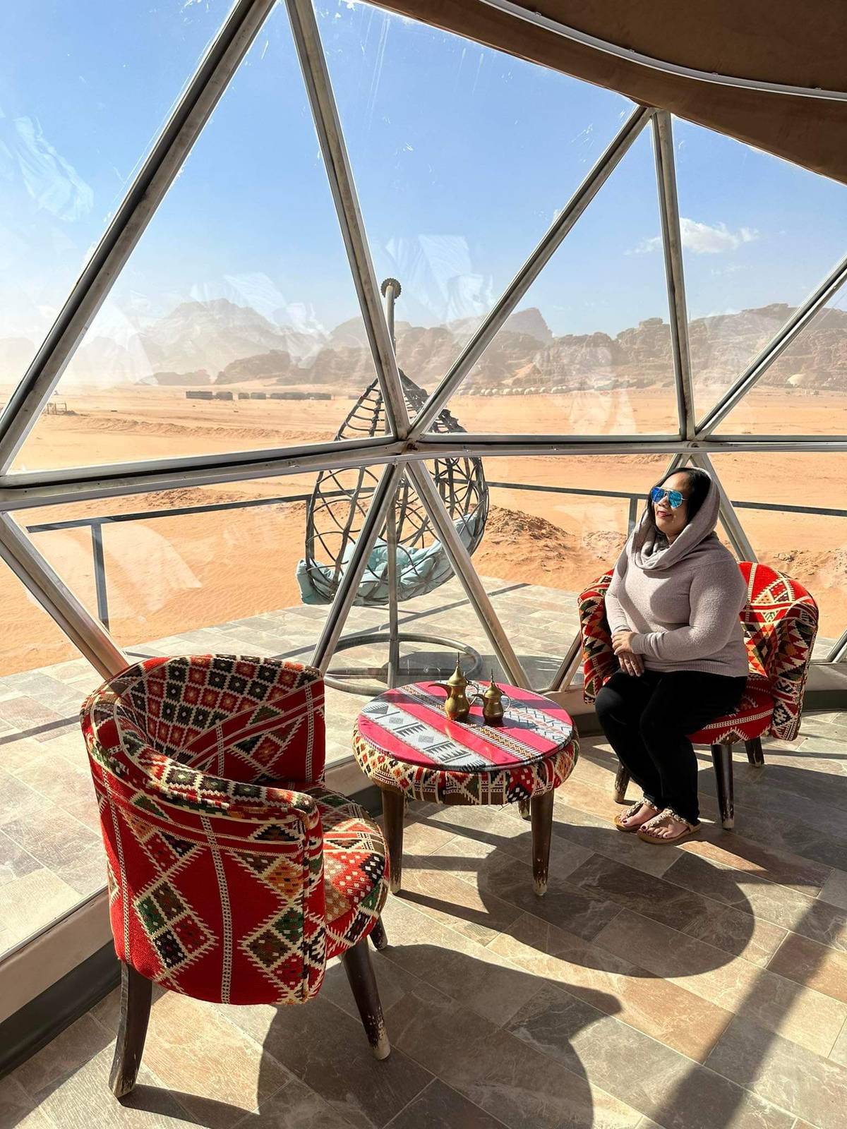 The clear Martian Dome lets you observe the ever changing colors of the Wadi Rum Desert.