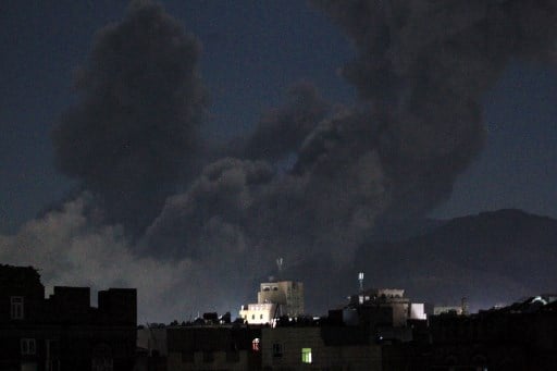 A plume of smoke billows during a US strike on Yemen's Huthi-held capital Sanaa early on March 16, 2025. The first US strikes against Yemen's Huthis since President Donald Trump took office in January killed at least 31 people, the rebels said on March 16, as Washington warned Iran to stop backing the group.