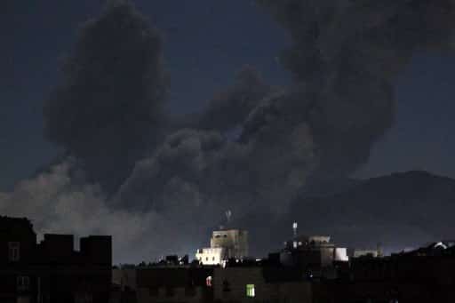 A plume of smoke billows during a US strike on Yemen's Huthi-held capital Sanaa early on March 16, 2025. The first US strikes against Yemen's Huthis since President Donald Trump took office in January killed at least 31 people, the rebels said on March 16, as Washington warned Iran to stop backing the group.