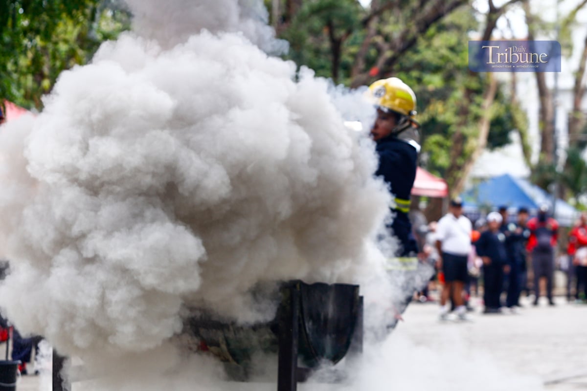 Fire volunteers from various barangays in San Juan City compete in obstacle courses simulating fire emergencies during the annual Fire Olympics on 17 March 2025.