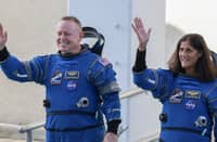 NASA’s Boeing Crew Flight Test Commander Butch Wilmore (L) and Pilot Suni Williams walk out of the Operations and Checkout Building on 5 June 2024 in Cape Canaveral, Florida.