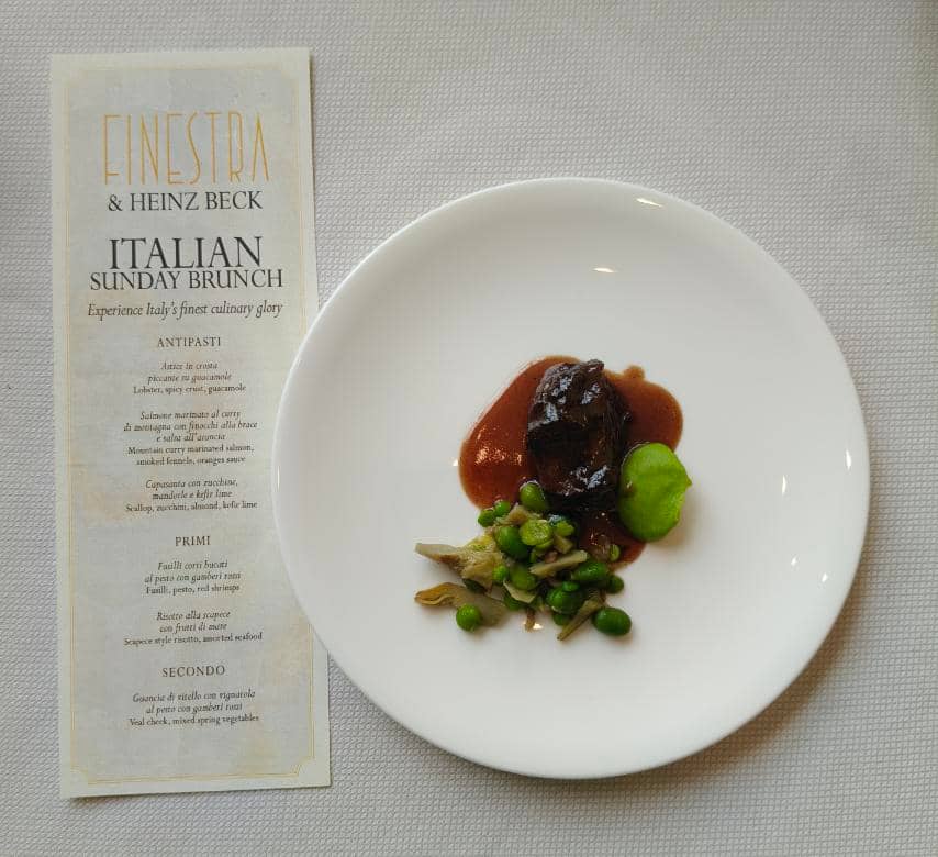 Guancia di vitello con vignarola al pesto con gamberi rossi Veal cheek, mixed spring vegetables.