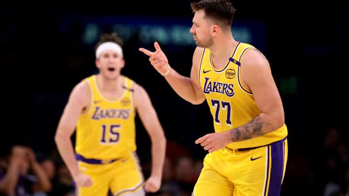 Luka Doncic sizzles with 31 points to power the Los Angeles Lakers to a 120-108 win over the Denver Nuggets in the NBA regular season.