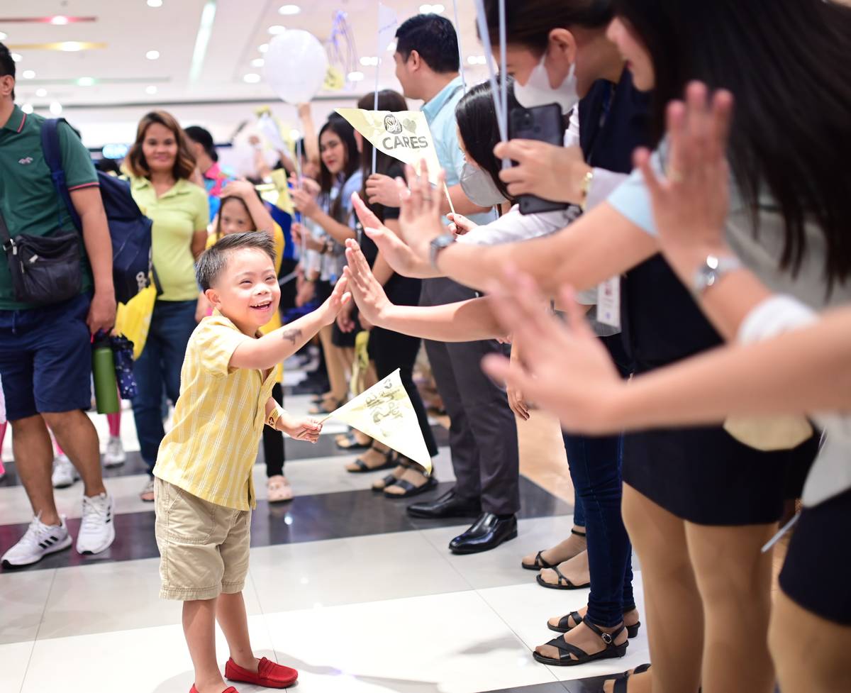 Participants come together to show love and support for individuals with Down Syndrome.