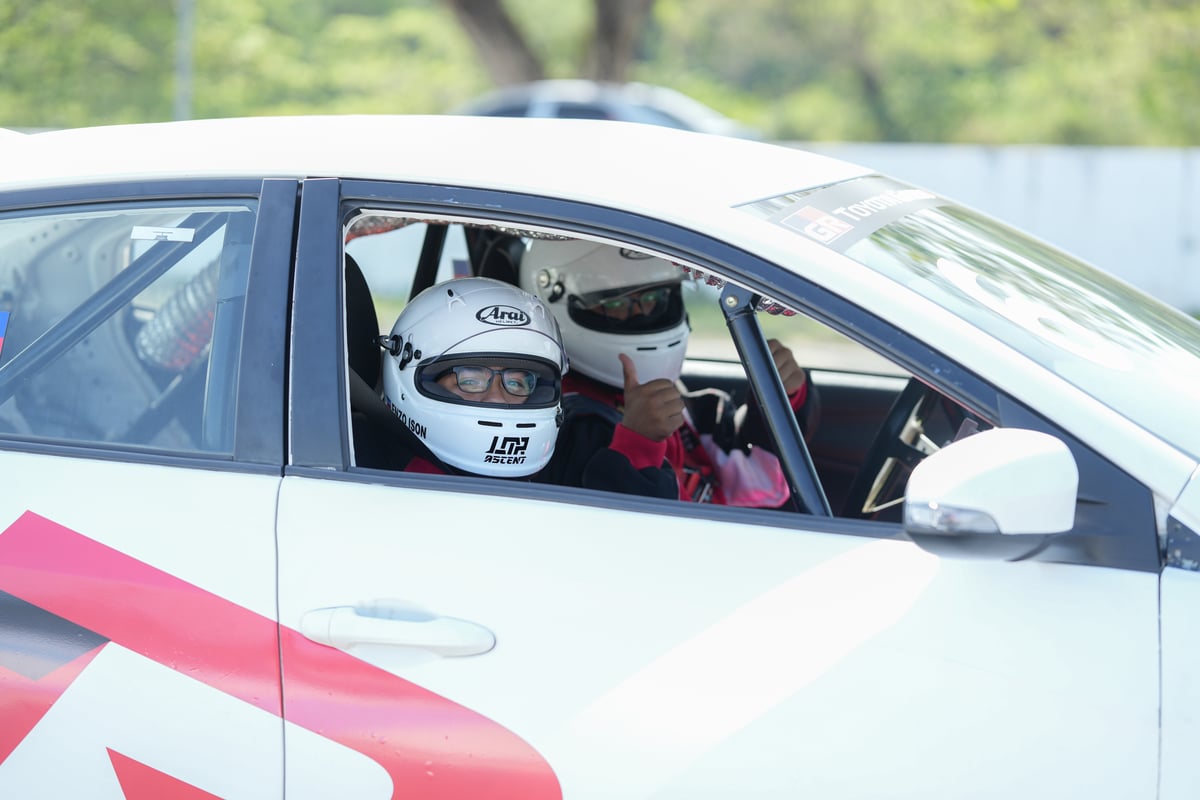 SUITED up and ready to roll — aspiring racers gear up for an adrenaline-fueled ride.