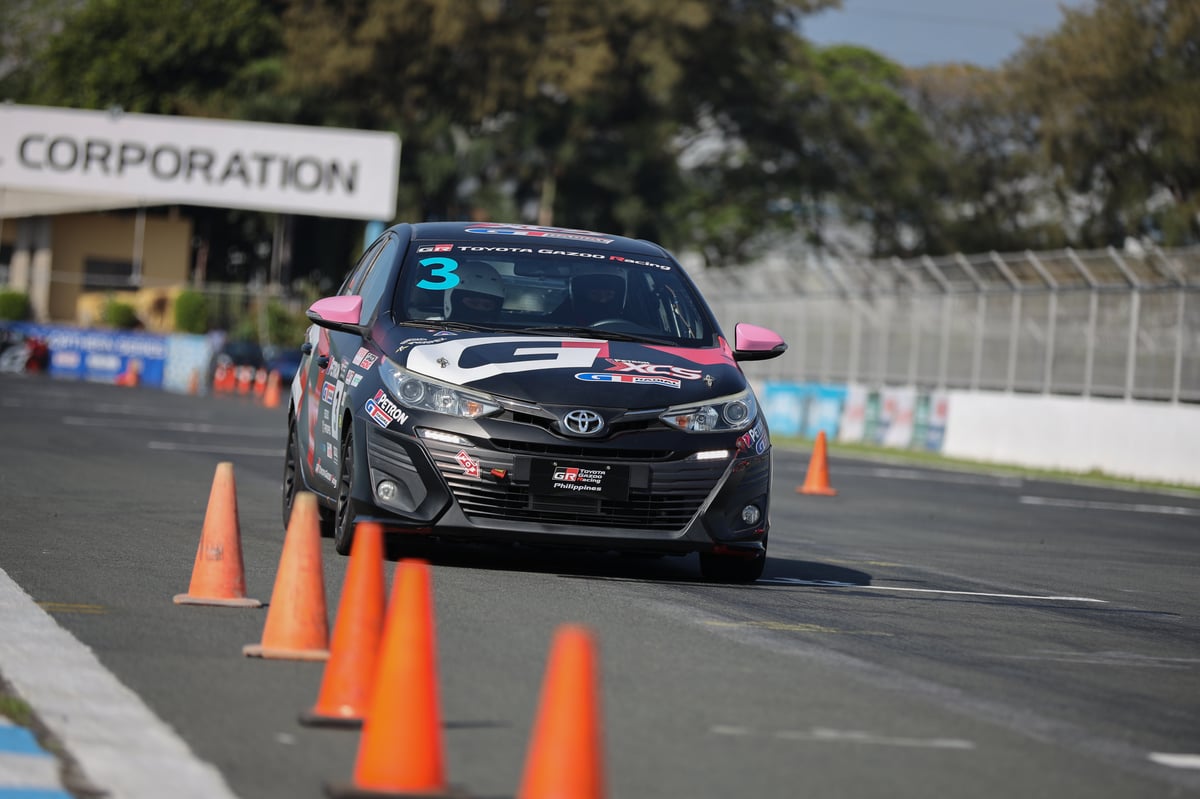 ASPIRING racers weave through the slalom challenge.