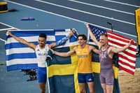 Sweden's Armand Duplantis (C), Greece's Emmanouil Karalis (L) and USA's Sam Kendricks celebrate after winning the men's pole vault final during the World Athletics Indoor Championship in Nanjing, in eastern China's Jiangsu province, on 22 March 2025.