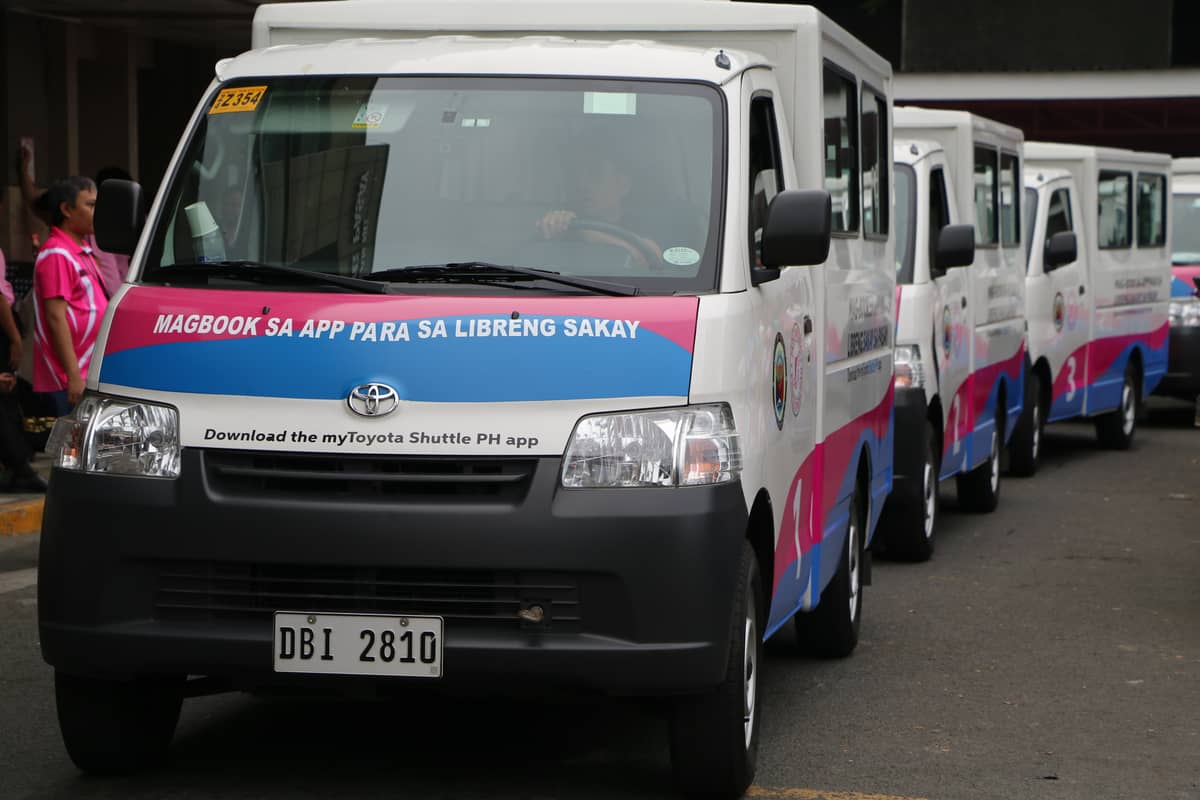 Toyota Lite Ace vans stand ready to serve Pasay City commuters through a tech-powered shuttle service.
