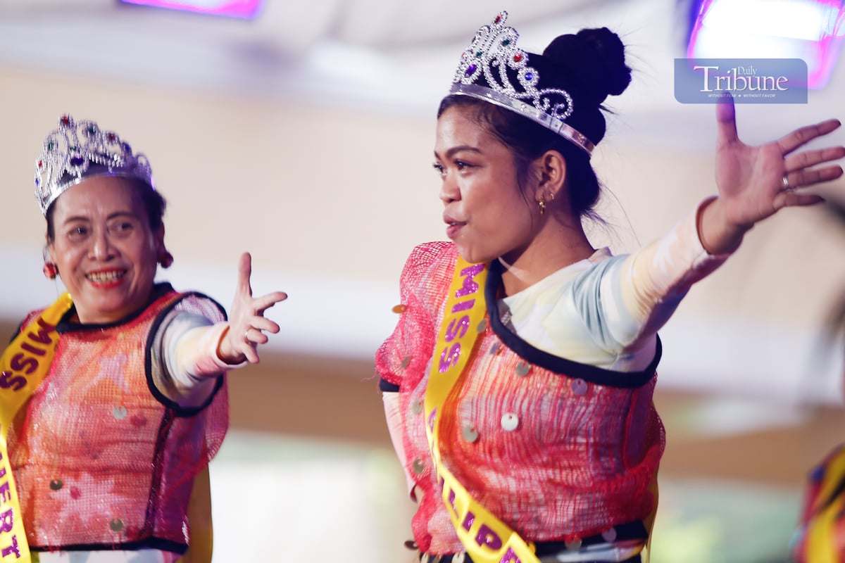 Women from various barangays in Quezon City compete in the Kababaihan Festival dance competition at the Quezon City Hall compound on 24 March 2025. Contestants also showcase costumes made from upcycled materials.
