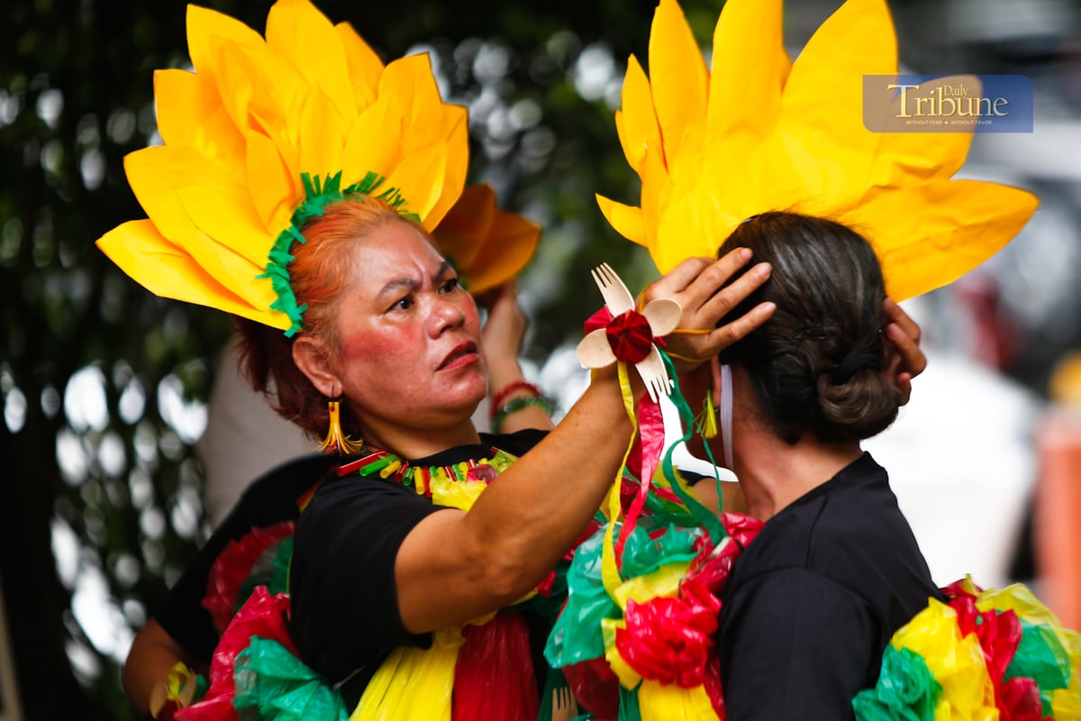 Women from various barangays in Quezon City compete in the Kababaihan Festival dance competition at the Quezon City Hall compound on 24 March 2025. Contestants also showcase costumes made from upcycled materials.