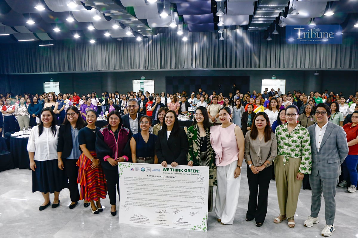 Quezon City Mayor Joy Belmonte leads the commitment signing during the Women in Climate Action Summit at the MICE Hall in Quezon City on 25 March 2025. The summit aims to mainstream gender-responsive climate action by integrating gender perspectives into climate planning.