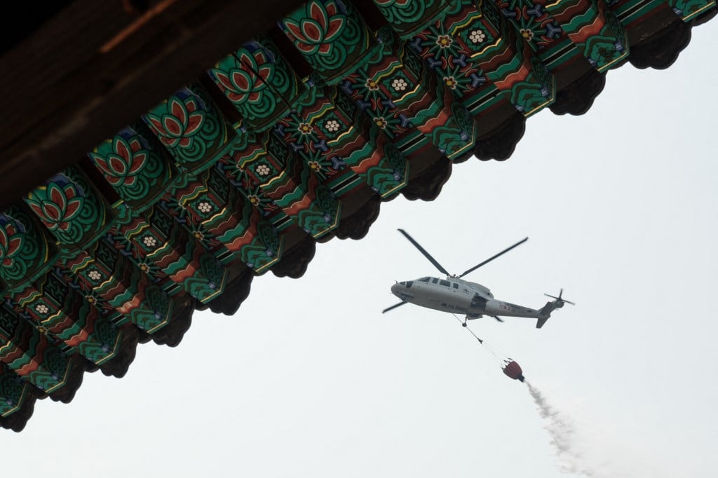 Temple burned, UNESCO-site evacuated as South Korea wildfires spread
