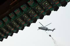 Temple burned, UNESCO-site evacuated as South Korea wildfires spread