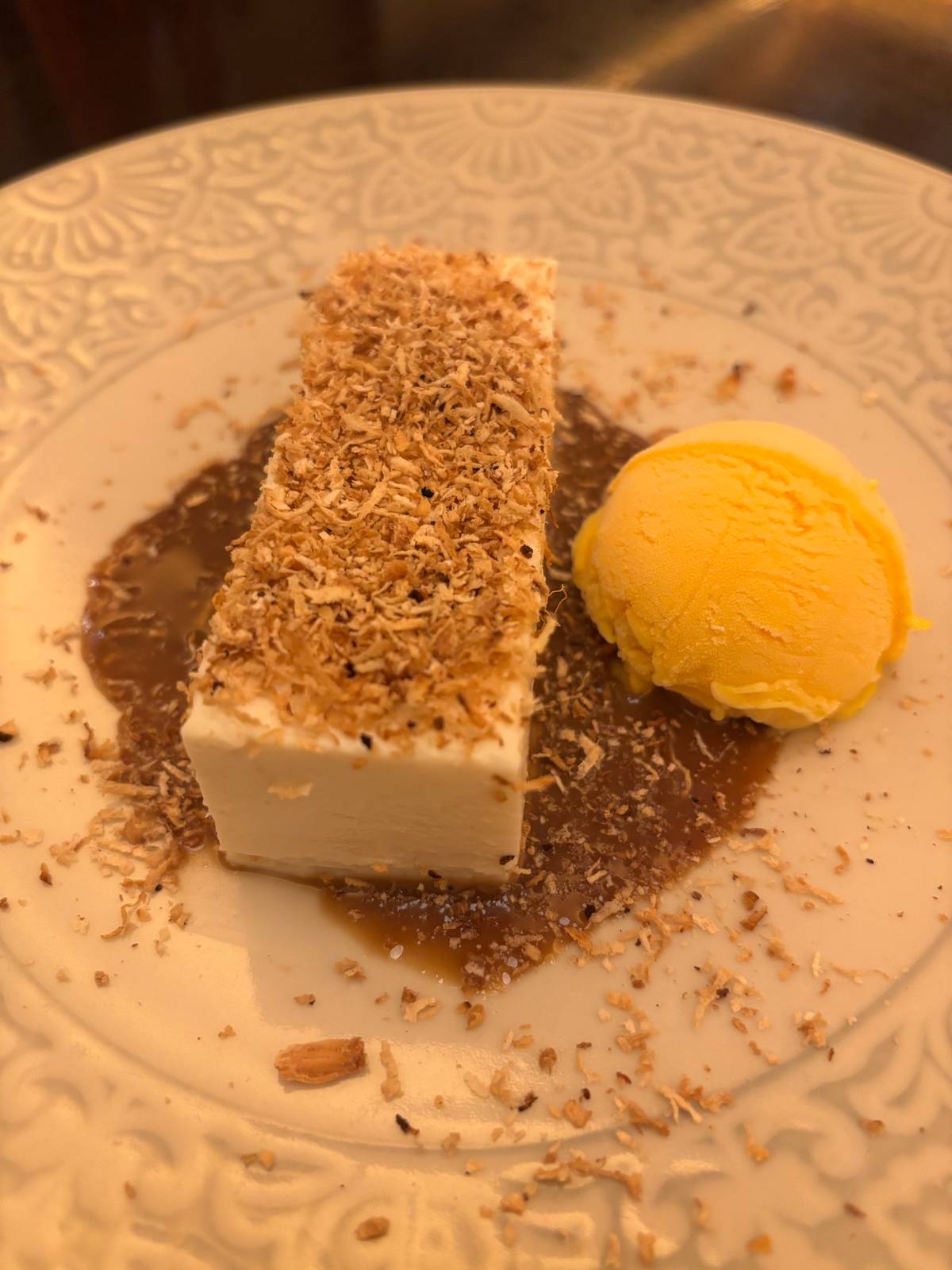 Tibok-tibok, carabao milk pudding served with cheese ice cream.
