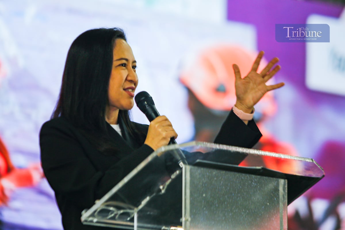 Quezon City Mayor Joy Belmonte leads the commitment signing during the Women in Climate Action Summit at the MICE Hall in Quezon City on 25 March 2025. The summit aims to mainstream gender-responsive climate action by integrating gender perspectives into climate planning.