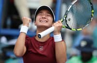MIAMI GARDENS, FLORIDA - 26 MARCH: Alexandra Eala of the Philippines reacts at match point after defeating Iga Swiatek of Poland on Day 9 of the Miami Open at Hard Rock Stadium on 26 March 2025 in Miami Gardens, Florida.