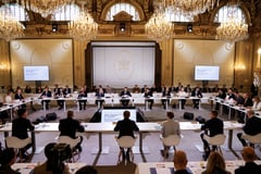 Paris summit rejects Russia sanctions relief, sketches Ukraine force