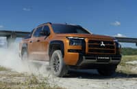 WITH its bold stance and rugged style, the Mitsubishi Triton kicks up dust as it dominates off-road terrain.