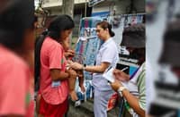 MAKATI City health workers vaccinate a child against measles in Barangay San Isidro.
