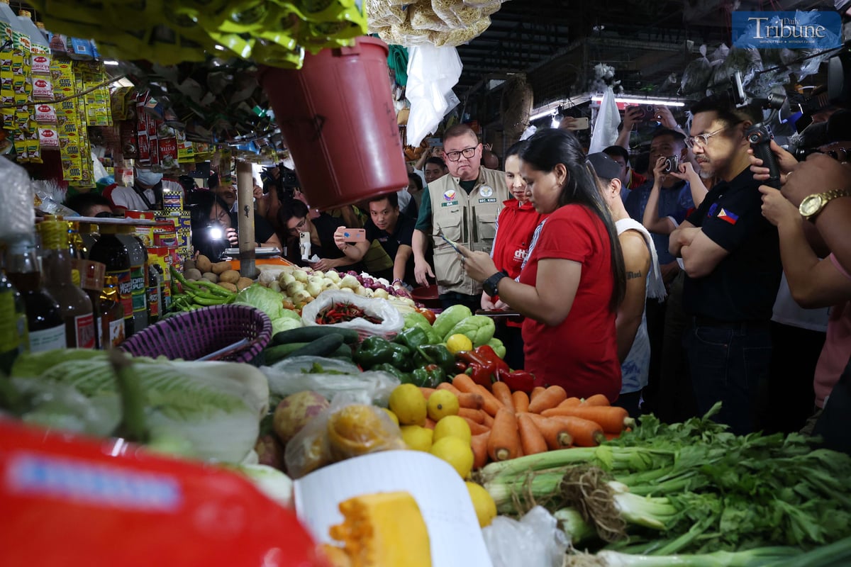 Agriculture Secretary Francisco Tiu Laurel and Trade and Industry Secretary Maria Cristina Roque visit Mega Q-Mart to monitor market prices, ensure compliance with the Maximum Selling Retail Price (MSRP) for rice and pork, and check prices of other basic necessities and prime commodities.