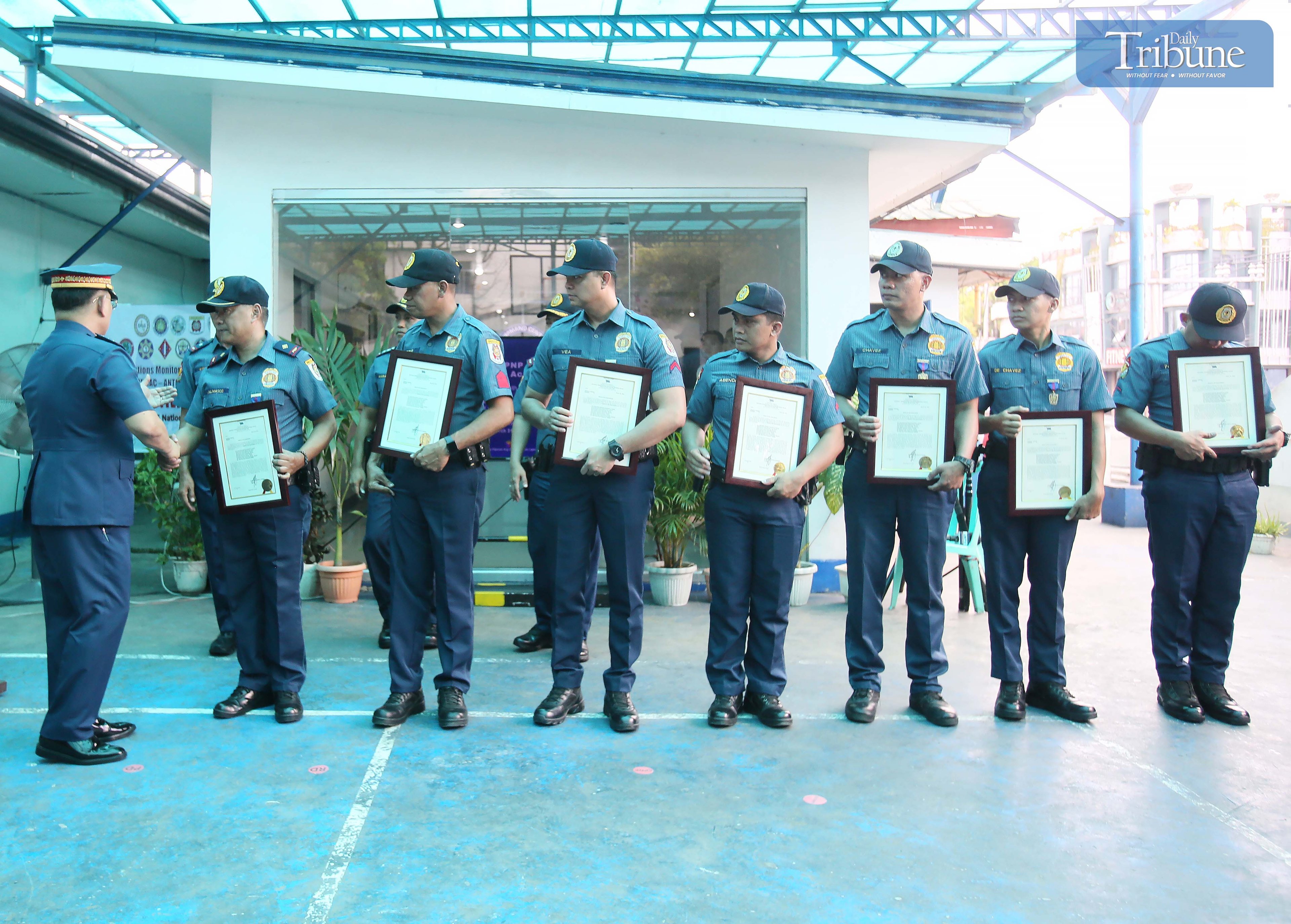 PNP Chief Rommel Marbil congratulates eight Antipolo police personnel during a medal awarding ceremony at the Antipolo Component City Police Station on Monday, 31 March 2025. The recognition was for their swift arrest of a suspect involved in a road rage incident along Marcos Highway in Sitio Calumpang, Barangay San Jose, Antipolo, on Sunday afternoon.