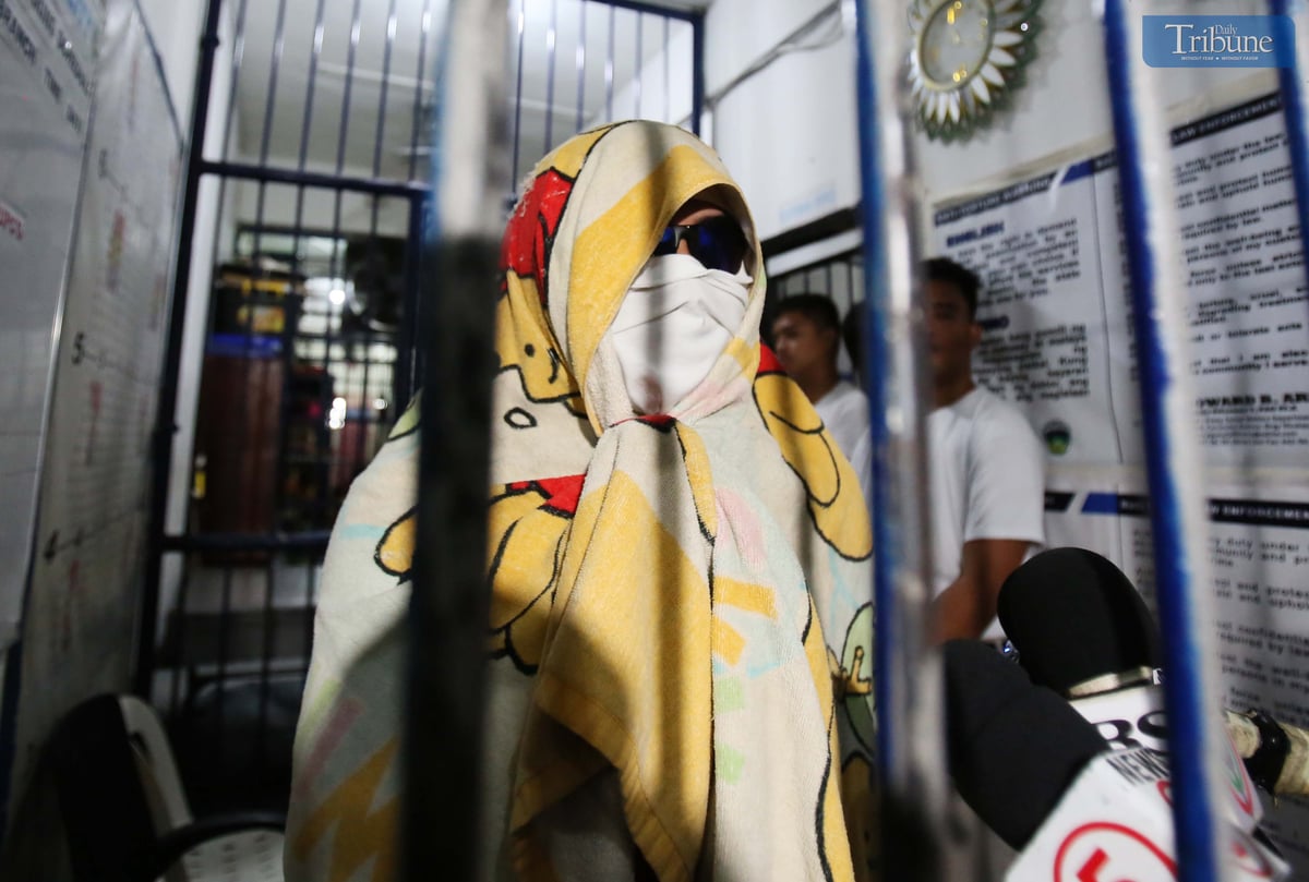 Kenneth Bautista, the suspect in a road rage incident in Antipolo City, speaks to the media during an interview at the Antipolo City Police Station on Monday, sharing his side of the shooting incident that left four people injured, including his partner.