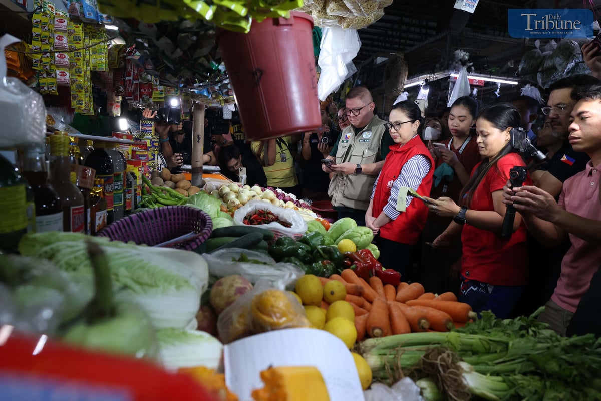 Agriculture Secretary Francisco Tiu Laurel and Trade and Industry Secretary Maria Cristina Roque visit Mega Q-Mart to monitor market prices, ensure compliance with the Maximum Selling Retail Price (MSRP) for rice and pork, and check prices of other basic necessities and prime commodities.