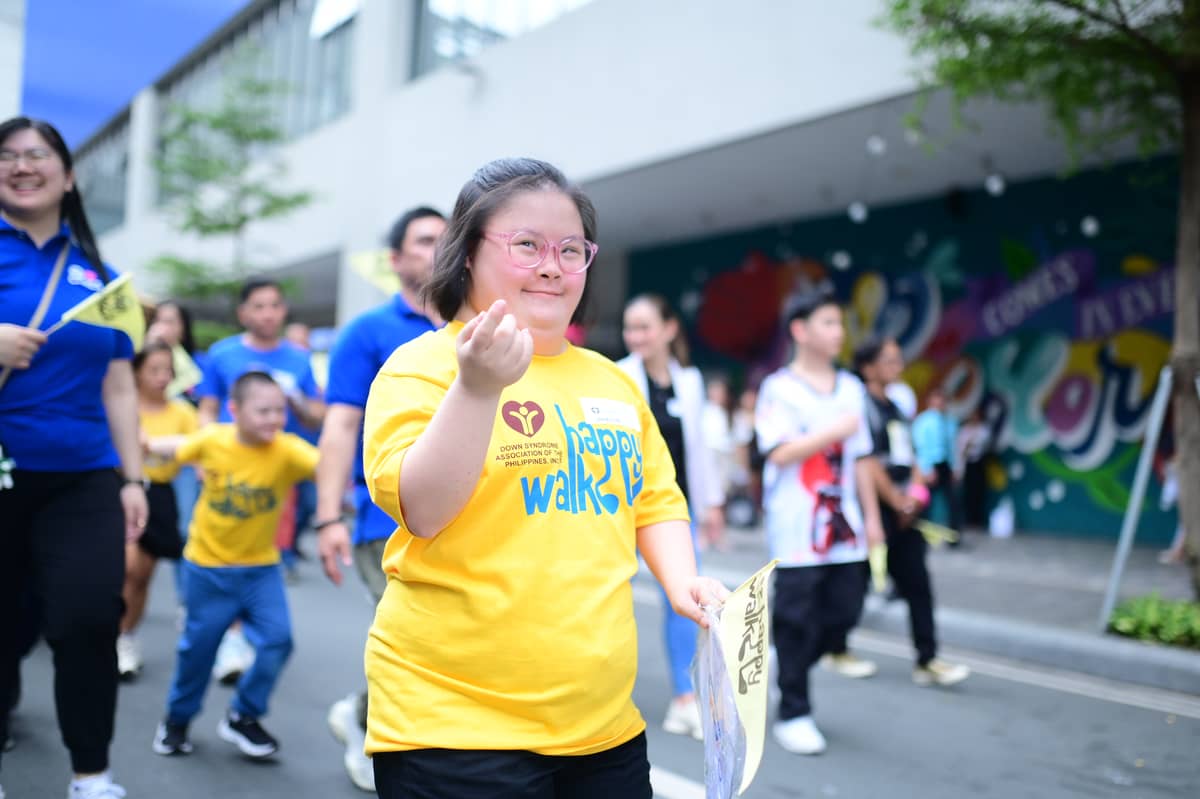 A happy walker gives her best smile as she leads this year’s parade.