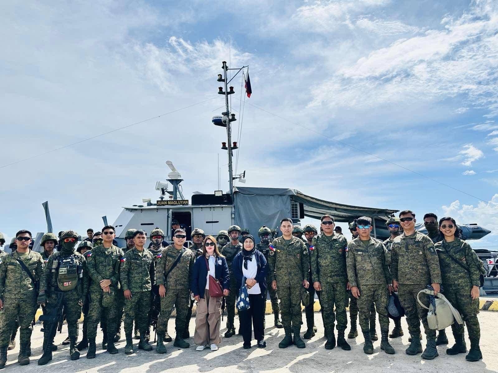 1102nd Brigade Commander Brig. Gen. Delos Santos, along with COMELEC and military officials, during their official visit to Banguingui, Sulu, on 2 April.