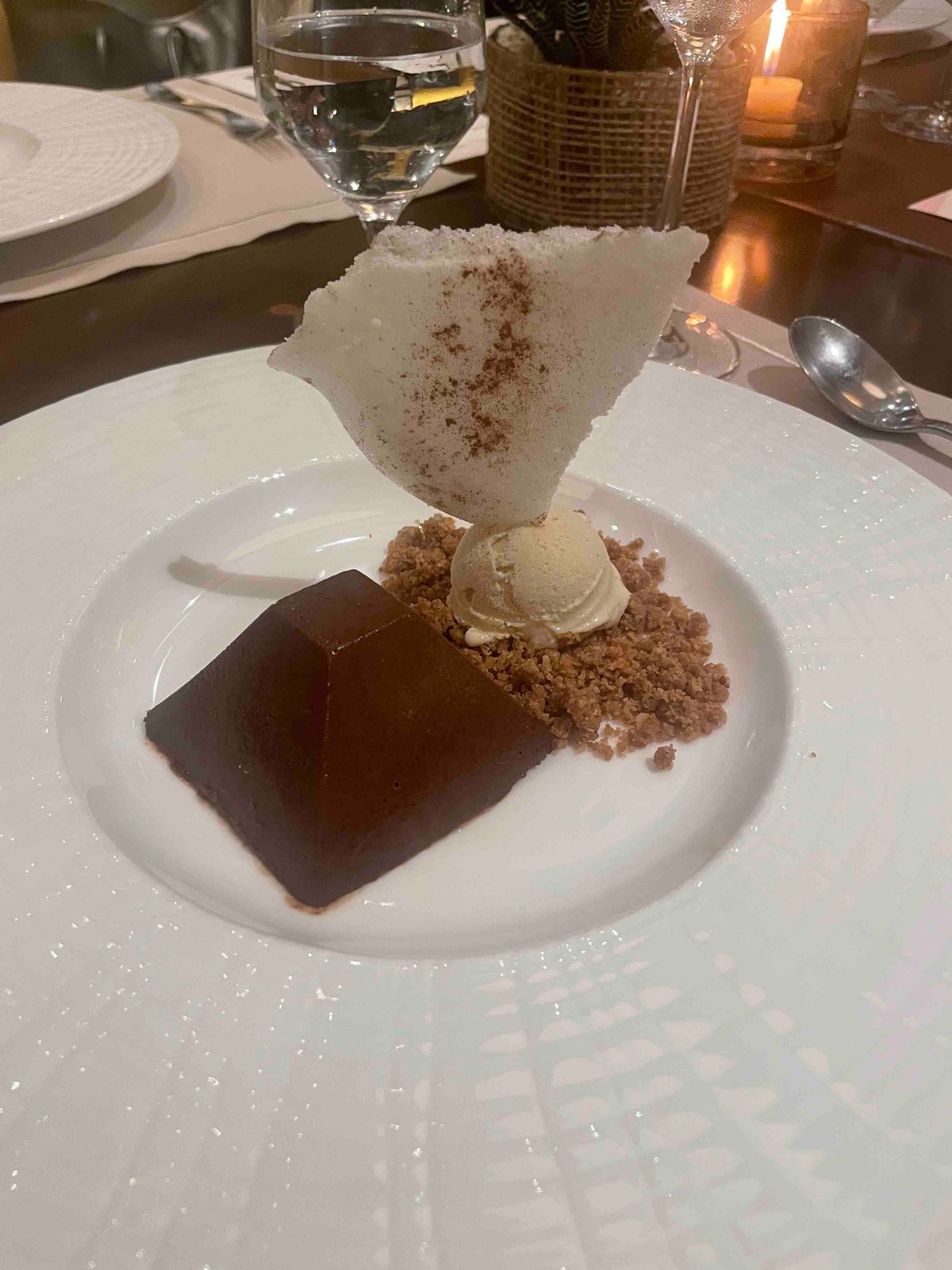 Flourless chocolate cake "de mi abuela": toasted rice ice cream, cinnamon milk crisps.