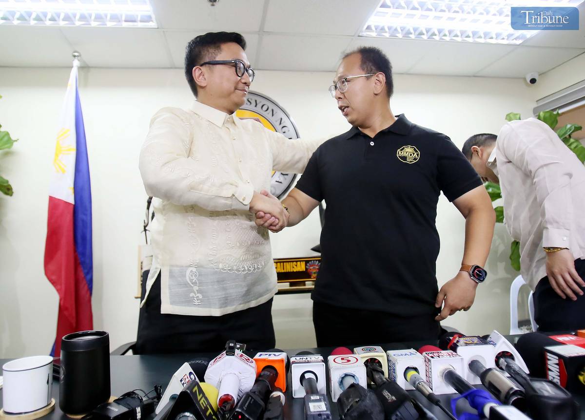 MMDA special operations head Gabriel Go apologizes for posting a video ticketing a cop for parking on the sidewalk during a press conference with NAPOLCOM Commissioner Rafael Vicente Calinisan, 3 April 2025, at the DILG-NAPOLCOM building in Quezon City.
