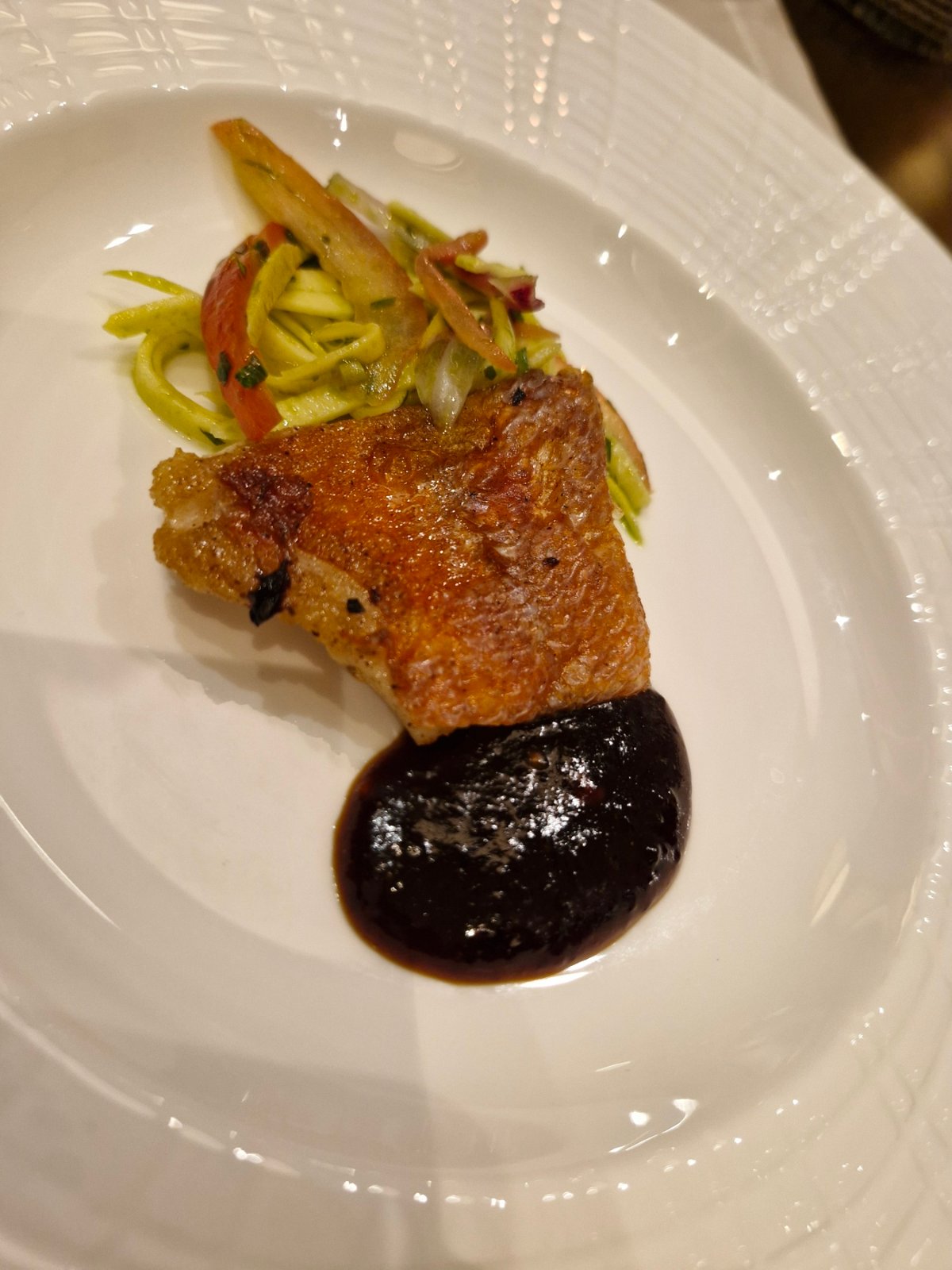 Japanese kindmedai (golden-eye snapper) with Mexican nam phrik and green mango salad.