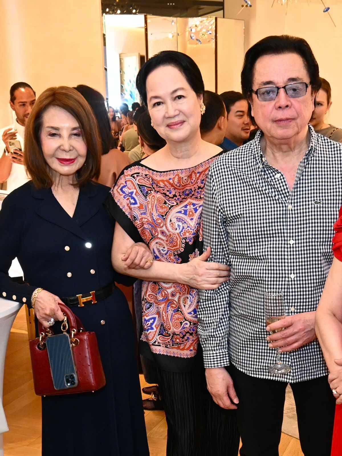 Angola Consul Helen Ong, Frannie and Ramon Jacinto.